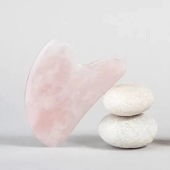 Rose quartz gua sha sculpting tool medical aesthetics hudson valley